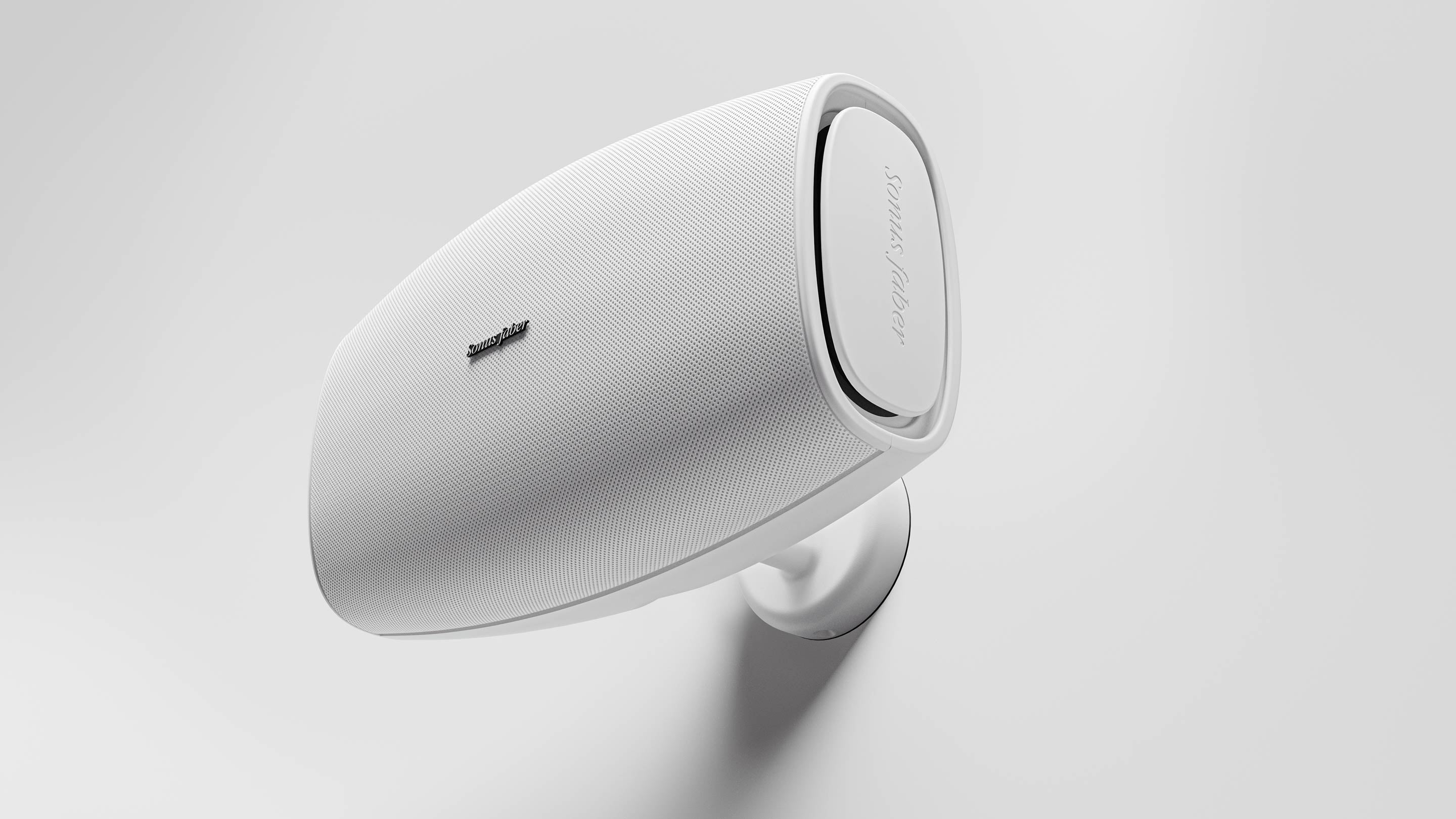 The Sonus faber Aster outdoor speaker, elegantly displayed on a wall to enhance its aesthetic appeal.