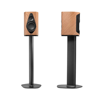 A front view of the Sonus faber Duetto wireless bookshelf speaker on a stand in walnut wood finish.