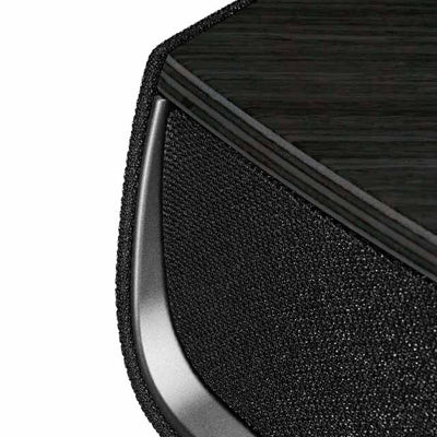 Close-up of Sonus faber Omnia wireless bookshelf speaker in Graphite, Black fabric, and Aluminum/Titanium finishes.