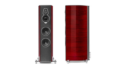 Pair of Sonus faber's Serafino G2 speakers in Red Wood, Italian Leather finish, revealing both front and side perspectives.